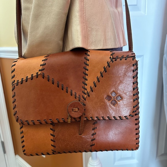 Patricia Nash Italian Leather crossbody.Brown and Tan.Excellent condition.